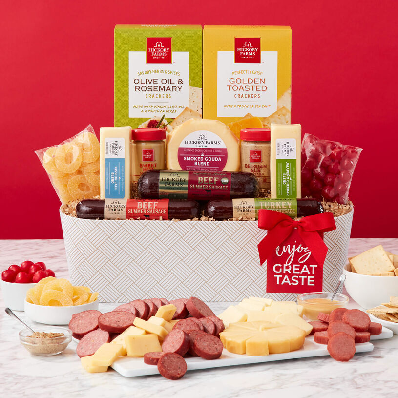 The Great Taste Gift Basket includes Beef sausage, Turkey Sausage, mustard, various cheeses and crackers, and candy