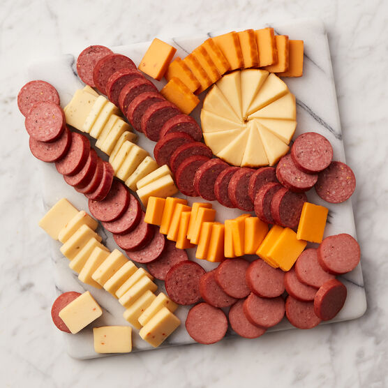 Cheese and Sausage Lover's Gift Box meat and cheese sliced and arranged on board