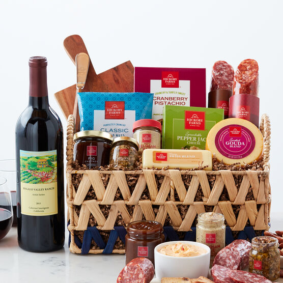 This Basket Is Filled With Savory Salami Cheeses Mustard Chutney Tapenade