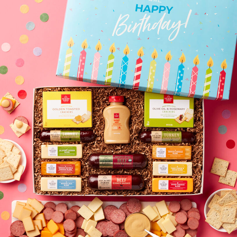 The Birthday Hearty Party Gift Box includes beef sausage, turkey sausage, mustard, crackers, and various cheeses