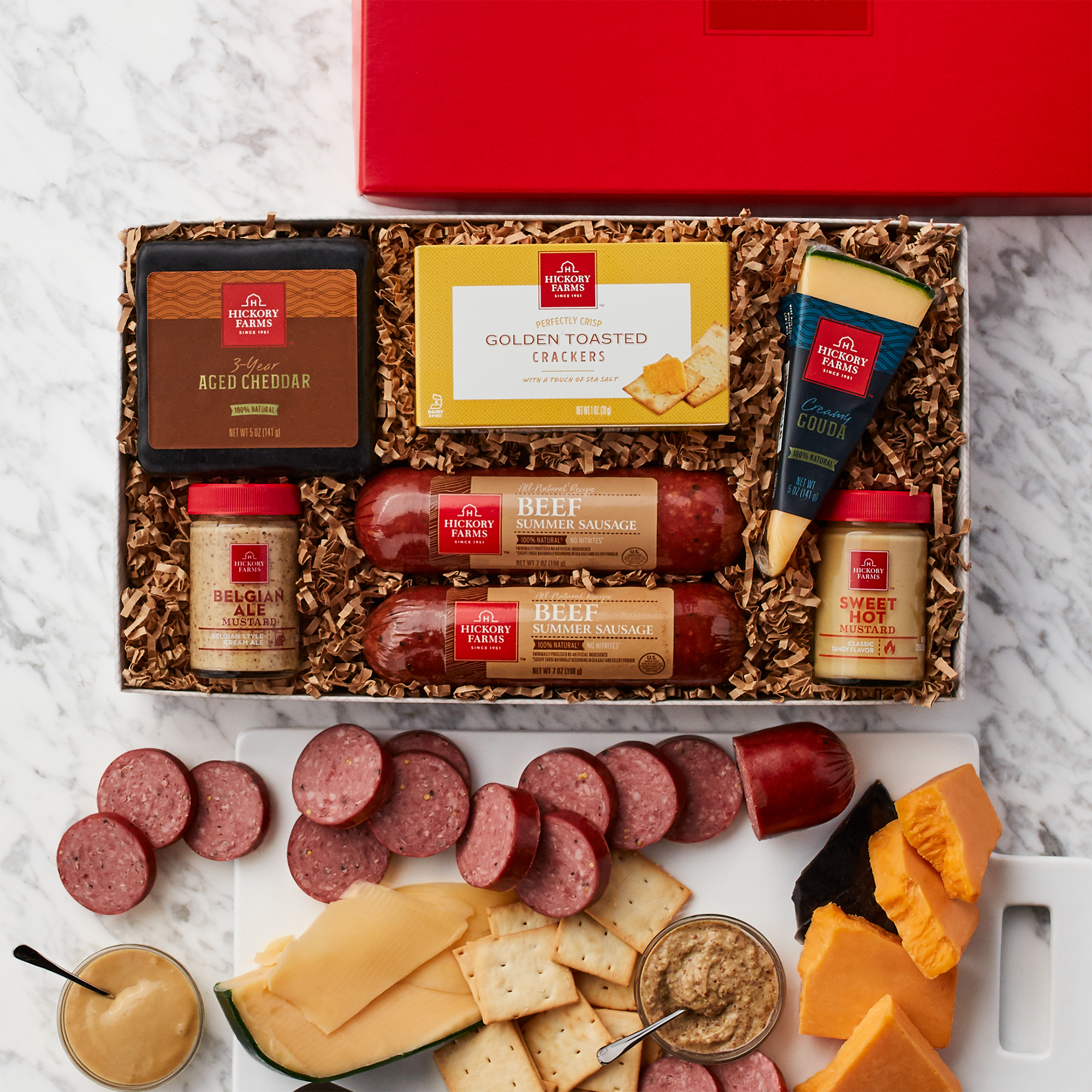 https://www.hickoryfarms.com/on/demandware.static/-/Sites-Web-Master-Catalog/default/dwa68e538f/images/products/all-natural-sausage-and-cheese-gift-box-008310-1.jpg